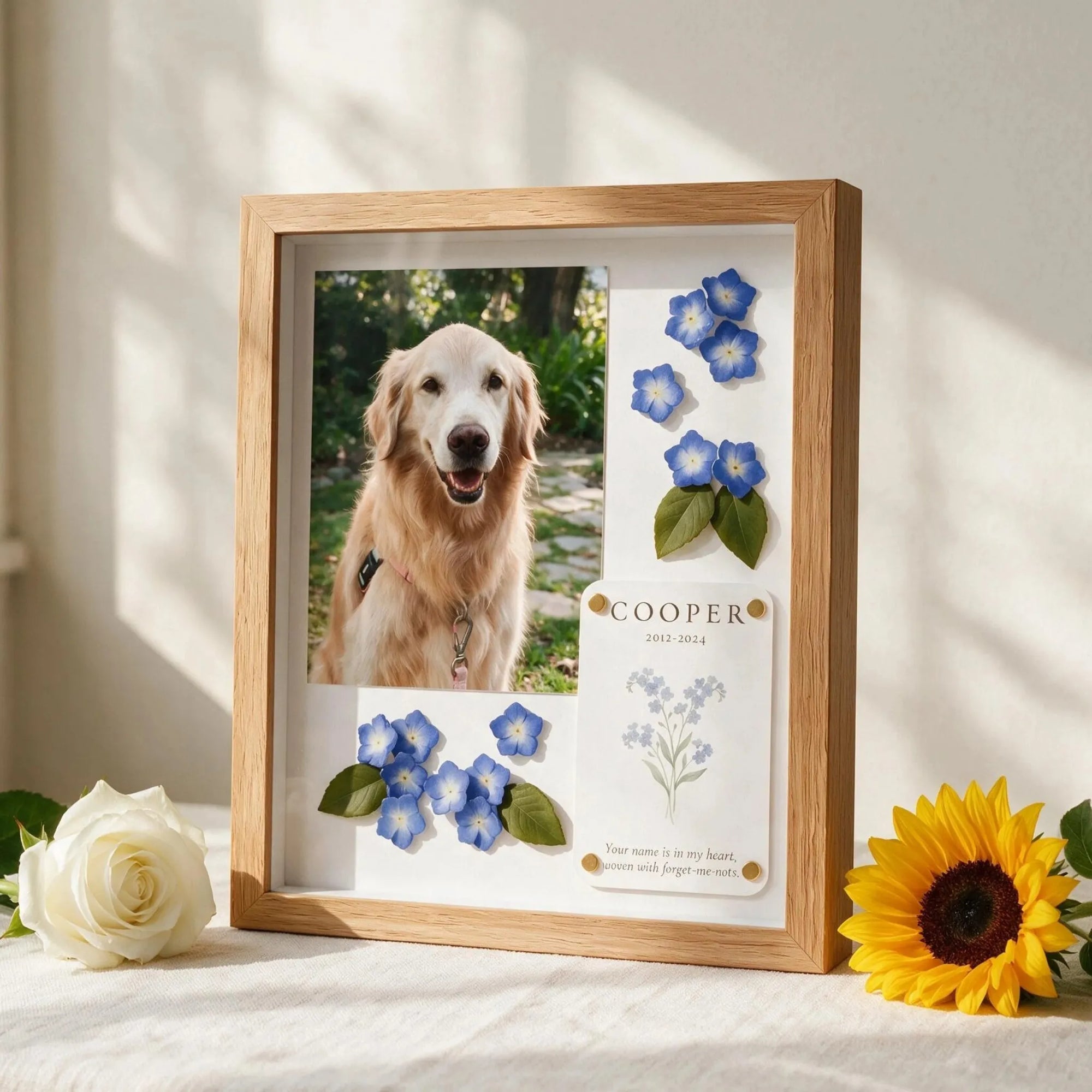 Personalized pet memorial shadow box with pet photo, name card, memorial words, and symbolic flowers