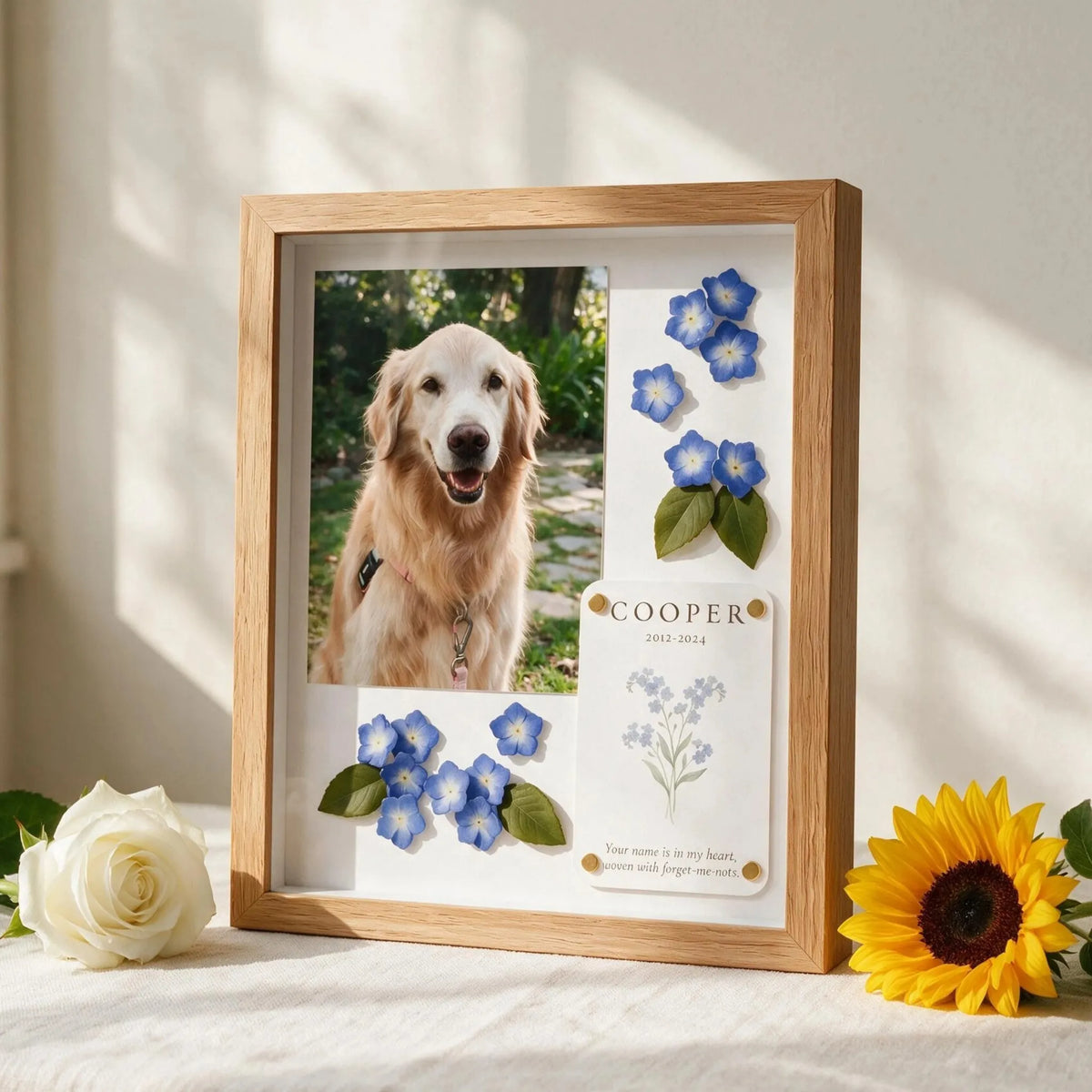 Personalized pet memorial shadow box with pet photo, name card, memorial words, and symbolic flowers