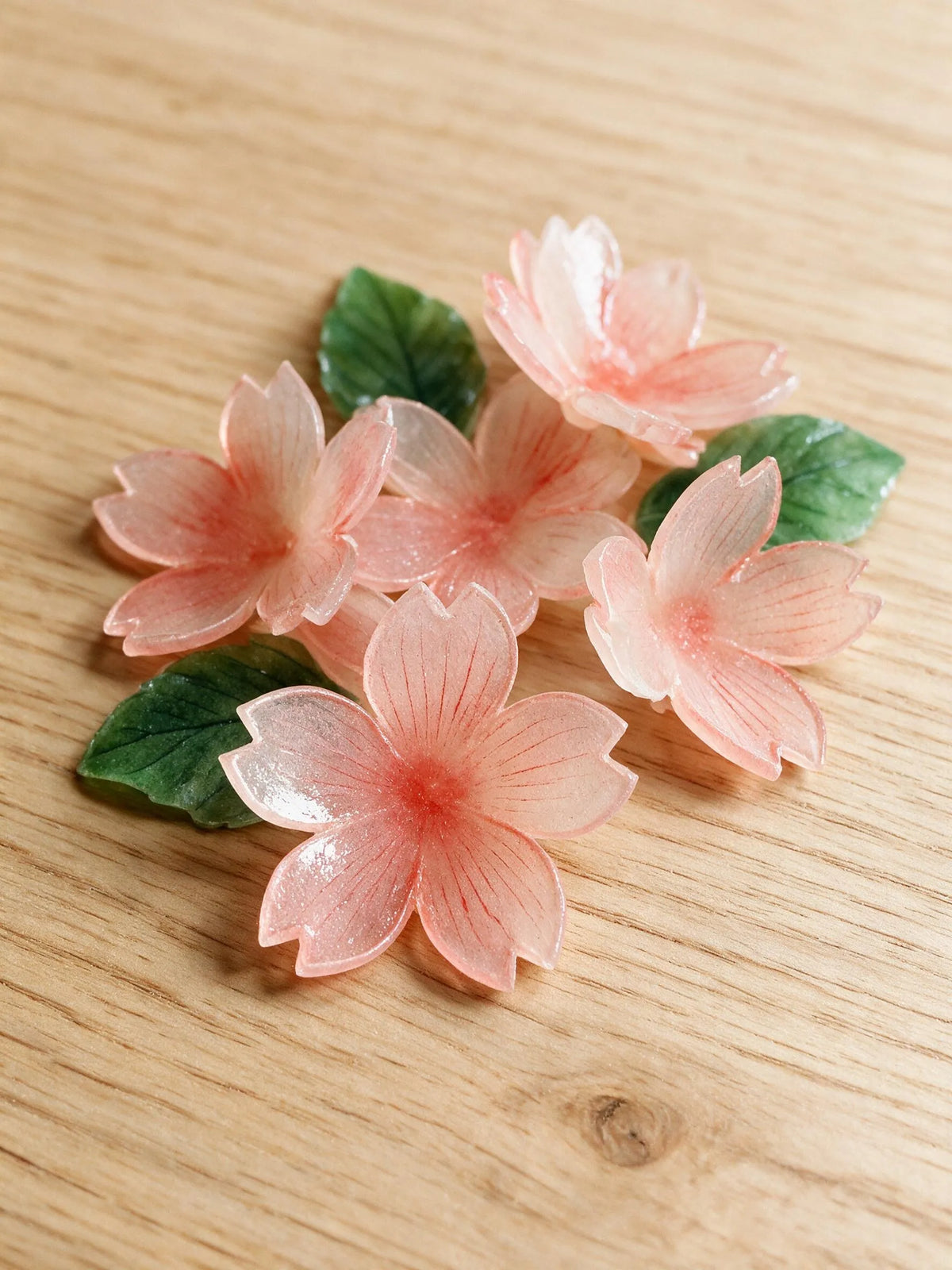 Handmade pink cherry blossom flowers for a personalized pet celebration shadow box