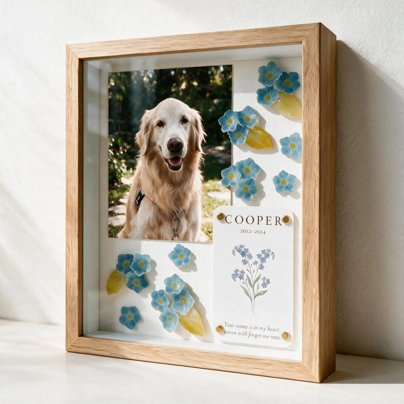 Detail view of blue forget-me-not flowers in the Forever in Bloom pet memorial shadow box