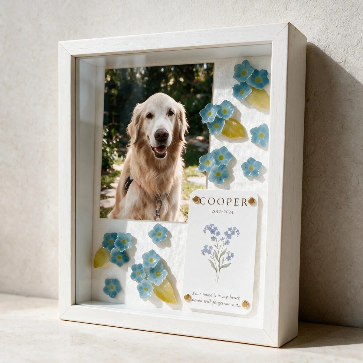 Personalized forget-me-not pet memorial shadow box in a solid white frame