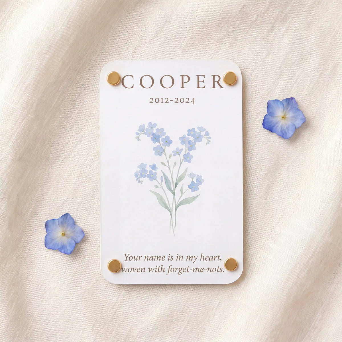 Personalized pet memorial card for Cooper with dates, forget-me-not artwork, and a remembrance message