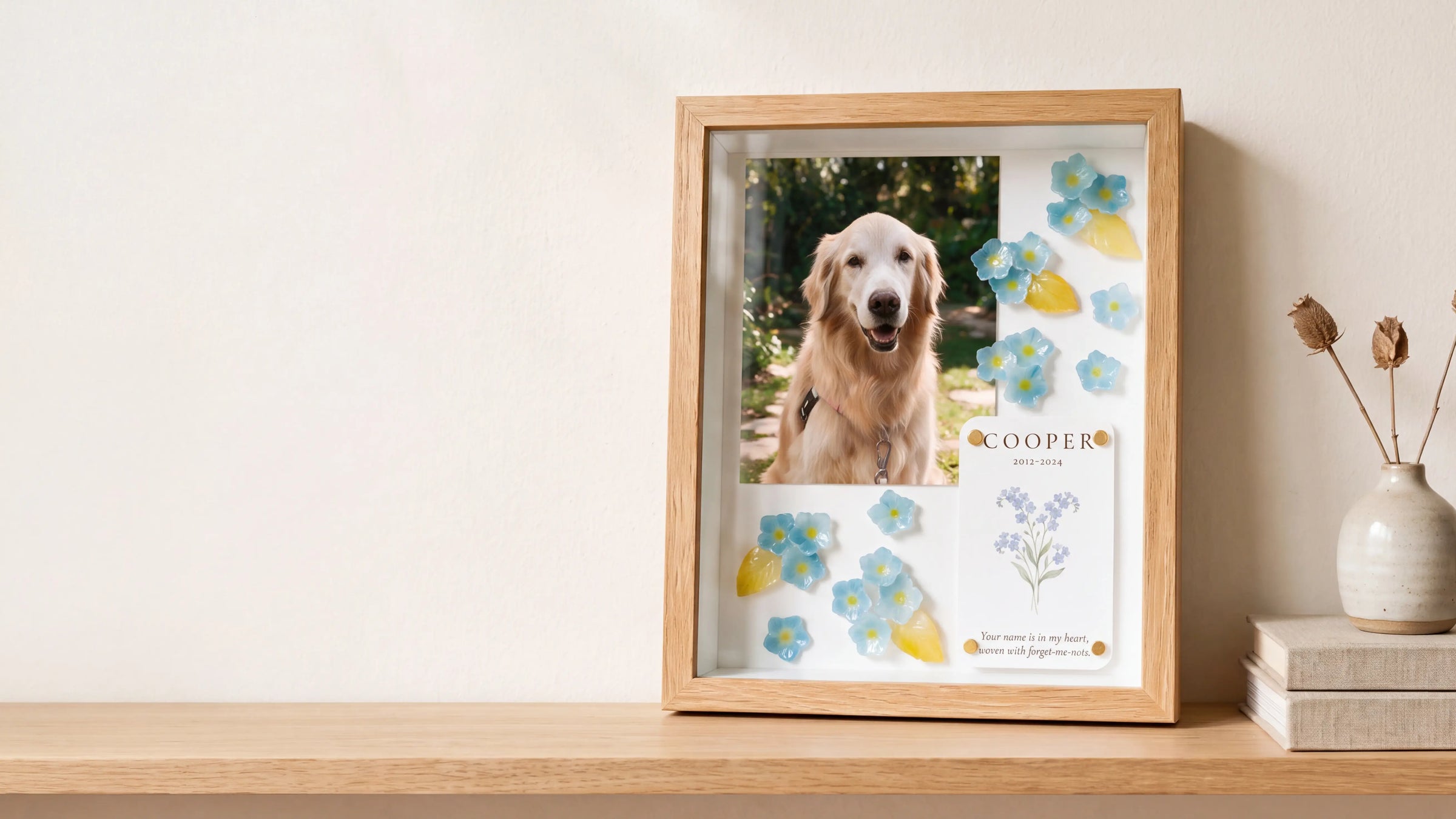Personalized pet memorial shadow box with a pet photograph, handmade forget-me-not flowers, and memorial card